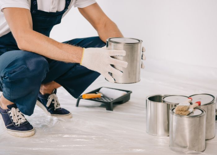 house painter with paint bucket minneapolis